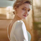 French Light Wedding Dress 2026 New Bridal Long-Sleeved Retro Minimalist Temperament Tug-Tailed Fasing Yarn Welcome Dress HZ0517