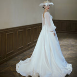 Light Wedding Dress French Super Fairy Travel Film Series Simple Long Sleeve 2026 New Bride Wedding Tail Wedding Yarn HZ0517
