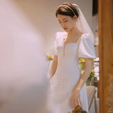 French Simple Light Wedding Dress 2026 Spring New Sen Family Travel Photography Retro-Screative White Bubble Sleeve Annual Meeting Dress HZ0517