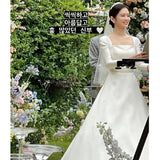 Zhang Nora Star Same Wedding Dress 2026 Spring New Linden Collar Simple Long-Sleeved Retro Temperament Main Yarn HZ0517