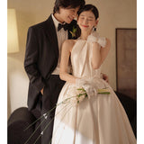 Bride Main Wedding Dress 2026 New French Retro Retro Vertiny Hanging Neck Tirender Tride Tug-Back Tug-Up Studio Wedding Dress HZ0517