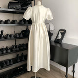 2026 Spring New Gentle Temperament Princess Dress Girl Pearl Round Collar Simple Long Travel Shot Daily Dress HZ0517