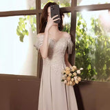 Champagne Evening Dress Dress Female Banquet Temperament Light Luxury Niche 2026 French Host High-End Art Exam Dress HZ0517