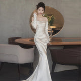 French Light Wedding Dress 2026 New Bride Simple Denswear A Word On The Shoulder White Waist Fishtail Evening Dress HZ0517