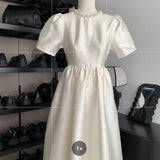 2026 Spring New Gentle Temperament Princess Dress Girl Pearl Round Collar Simple Long Travel Shot Daily Dress HZ0517