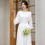 French Light Wedding Dress 2026 New Long Sleeve Simple Travel Shooting On The Exterior Of The Scene Of The Landscape Of The Super Fairy Welcome Guests Out Of The Yarn Thin HZ0517