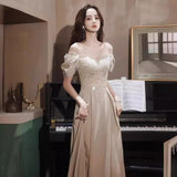 Champagne Evening Dress Dress Female Banquet Temperament Light Luxury Niche 2026 French Host High-End Art Exam Dress HZ0517