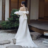 Travel Shooting With A Dilted Face Light Wedding Dress 2026 Spring New French Sexy Bareback Shoulder Temperament White Super Fairy Wedding Dress HZ0517