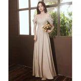 Champagne Evening Dress Dress Female Banquet Temperament Light Luxury Niche 2026 French Host High-End Art Exam Dress HZ0517