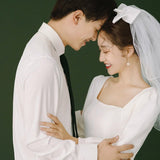 Sing Noodle Light Wedding Dress 2026 Spring New Travel Photo Retro Simple Long-Sleeved White Engagement Dress HZ0517