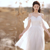 White License Small Dress 2026 New Temperament Short Fairy Elegant Thin Arm Wearing Dress HZ0517