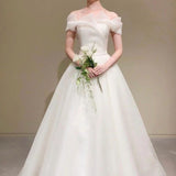 One-Word Shoulder French Light Wedding Dress 2026 New Sensential Light Dress Retro Small Man Go Out Yarn Small Dress HZ0517