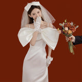 French Sling Light Wedding Dress Bridal Bridal Sen Tie Simple Super Fairy Bow Vertebry Fishtail Go Out Yarn Small Tail Dress HZ0517
