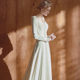 French Light Wedding Dress 2026 New Bridal Long-Sleeved Retro Minimalist Temperament Tug-Tailed Fasing Yarn Welcome Dress HZ0517