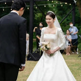 Zhang Nora Star Same Wedding Dress 2026 Spring New Linden Collar Simple Long-Sleeved Retro Temperament Main Yarn HZ0517